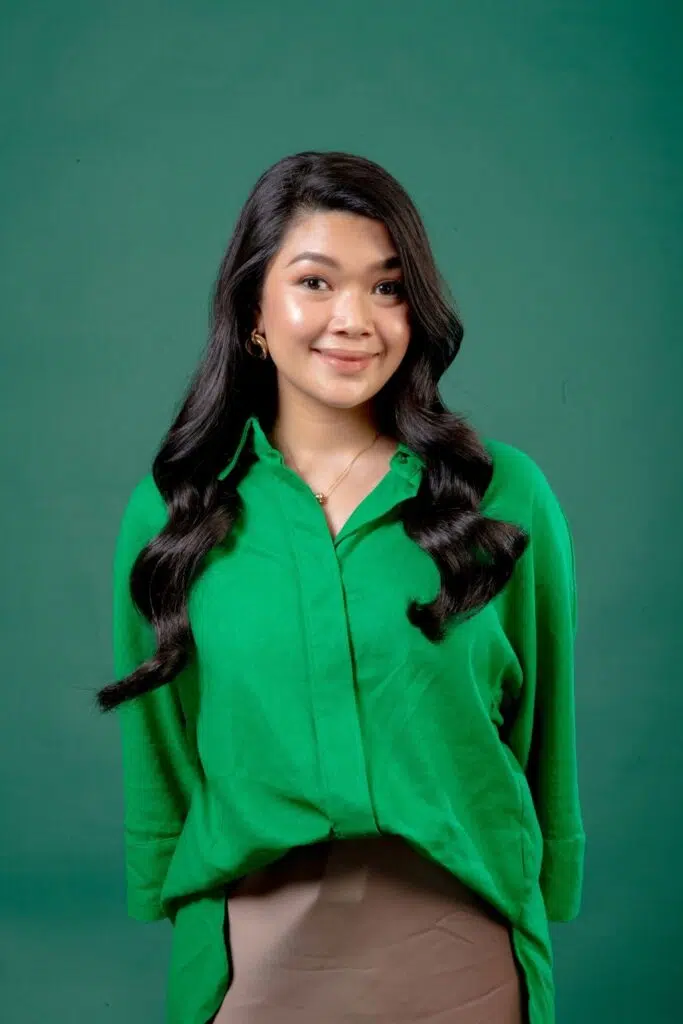 Aida Zunaidi in a green blouse