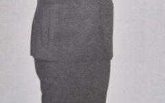 Full-body photo of Ng Shun Ming (Frank) standing with his arms crossed.